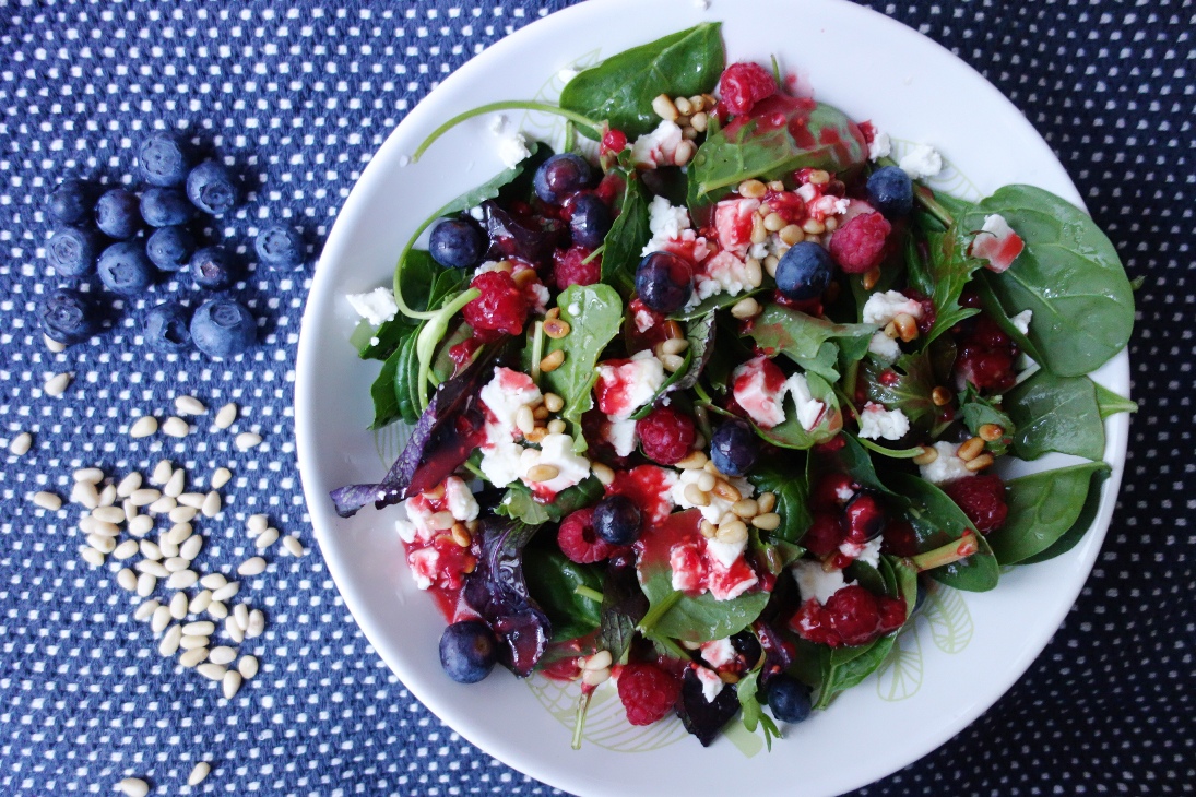 Wild herb salad with raspberries and feta