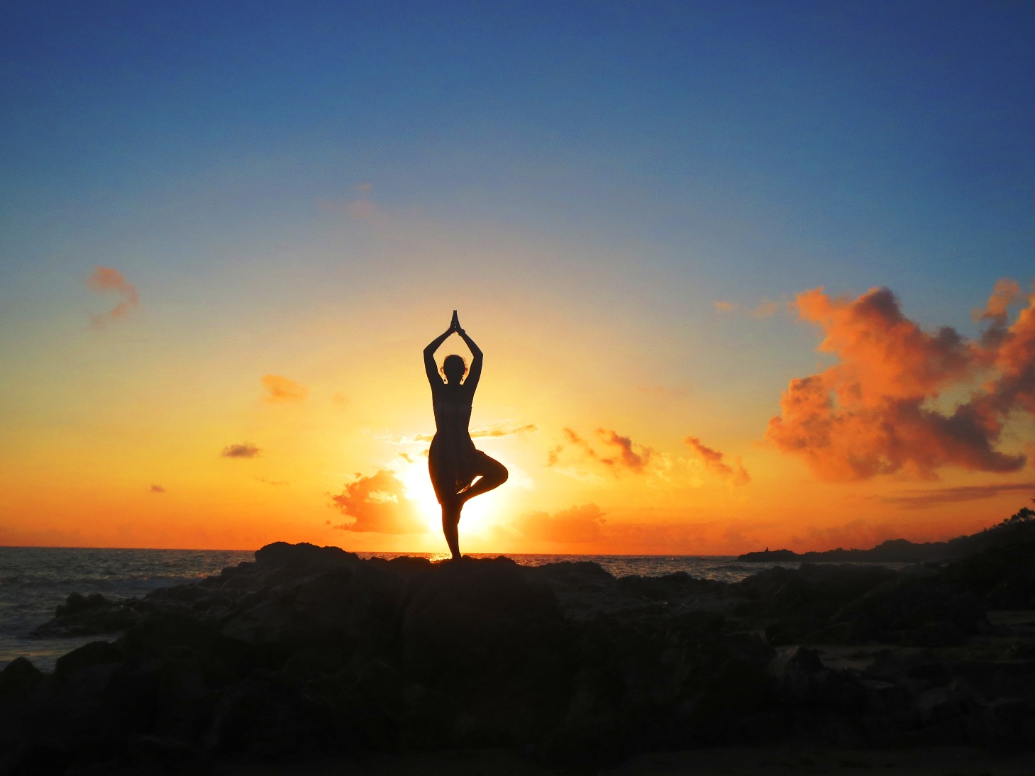 Yoga Tree Pose on beach